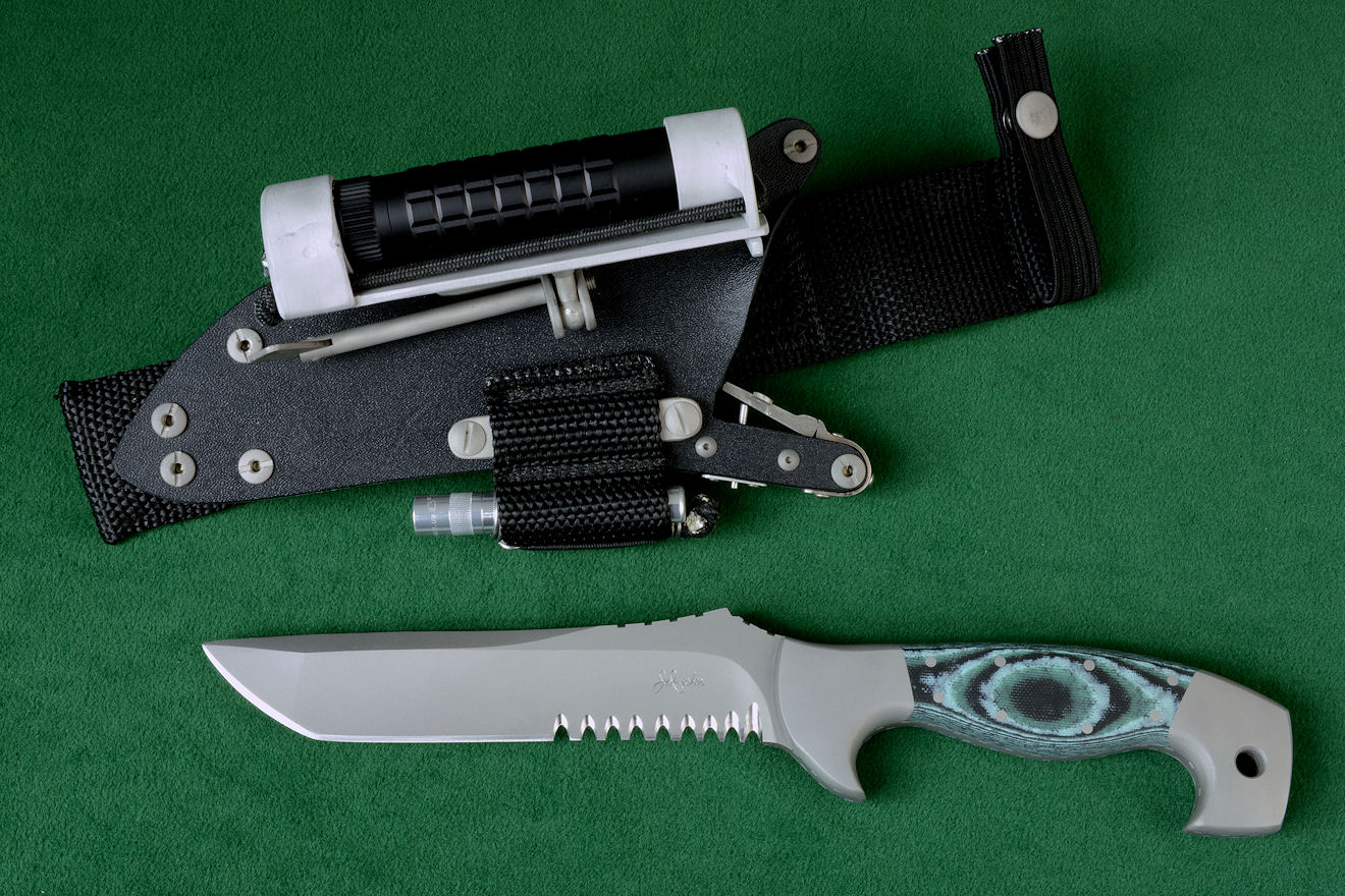 "Arctica" Tactical, Combat, Rescue knife, obverse side view in CPMS90V stainless steel blade, 304 stainless steel bolsters, Green, Black, Pistachio G-10 fiberglass/epoxy composite laminate handle, locking sheath in kydex, aluminum, stainless steel with ultimate belt loop extender and accessories