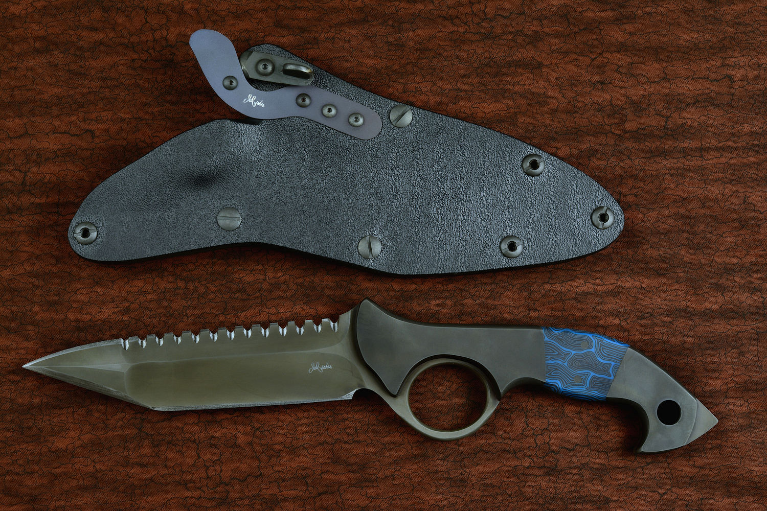 "Ari B'Lilah" counterterrorism, tactical, combat knife, obverse side view in T4 cryogenically treated 440C high chromium martensitic stainless steel blade, 304 stainless steel bolsters, blue/black tortoiseshell G10, black micarta  handle, hybrid tension tab locking sheath in kydex, anodized aluminum, anodized titanium, black oxide stainless steel