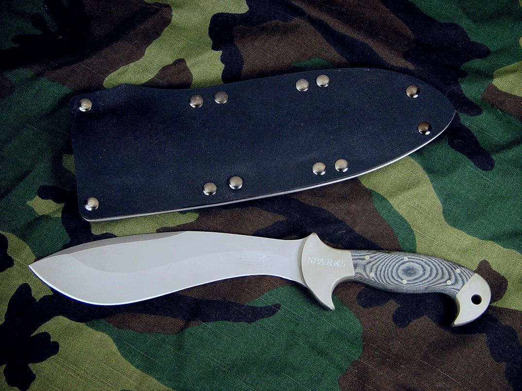 "Horrocks" custom tactical combat knife, obverse side view in 440C high chromium stainless steel blade, engraved nickel silver bolsters, canvas micarta phenolic handle, kydex, aluminum, blued steel sheath