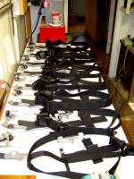 Group of counterterrorism knives under construction with sternum harnesses