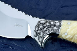 "Nunavut" 4 power enlargement of the obverse side bolster engraving in high nickel, high chromium 304 stainless steel