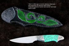 "Vulpecula" obverse side view in D2 extremely high carbon die steel blade, hand-engraved 304 stainless steel bolsters, Petrified Fern fossil gemstone handle, hand-carved leather sheath inlaid with rayskin